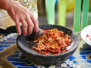 Making sambel tempeh. The tempeh chili flavor is very tasty and fragrant soybean. Delicious to eat with side dishes and warm rice.