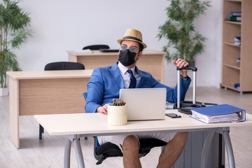 Businessman preparing for trip during pandemic