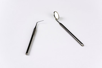 Dental tools on a white table