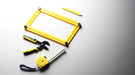 yellow tools construction tools ruler pasatigi