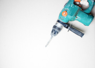 gloved hand drill hammer drill green