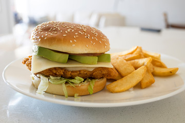 Crispy Chicken Avocado Sandwich with French Fries