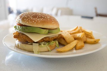 Crispy Chicken Avocado Sandwich with French Fries