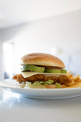 Crispy Chicken Avocado Sandwich with French Fries