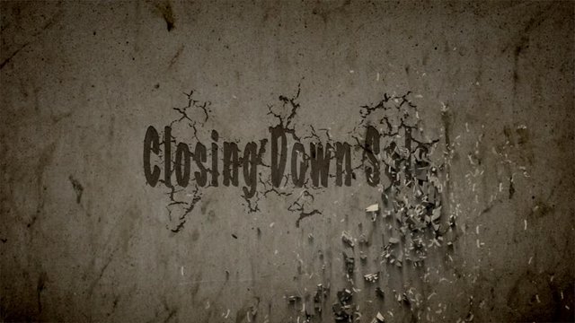 Closing down sale, a brick wall crumbling or text exploding from a wall.