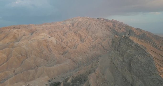 Stunning Landscape Of The Famous Jebel Hafeet Mountain In Al Ain, Abu Dhabi, United Arab Emirates. - aerial drone shot