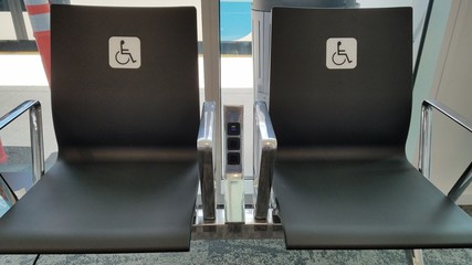 Disable chair seats in a new airport with nobody