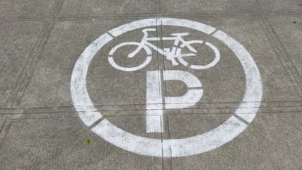 Parking sign dedicated for bicycle and cyclist on the pavement