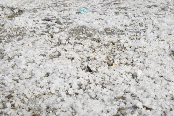 Salt field has Salt crystals on the floor.