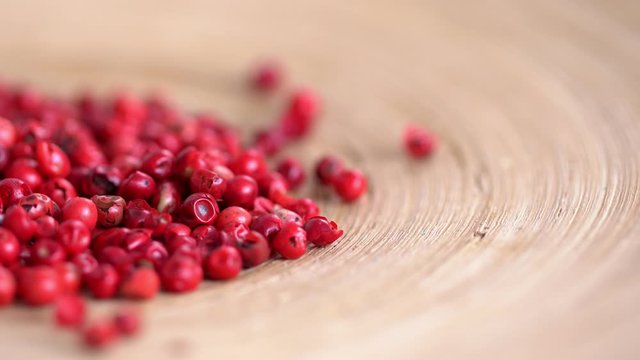 Food spices pink peppercorns red pepper Himalayan pepper berries. concept of fresh and dietary spices for cooking schools vegans and dietary products