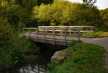 Bridge over river in a park