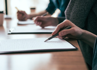 close up. a group of employees works with business documents.