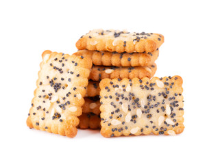 Square poppy seeds and sesame crackers isolated on white background. Dry cracker cookies isolated. Salty snacks isolated.