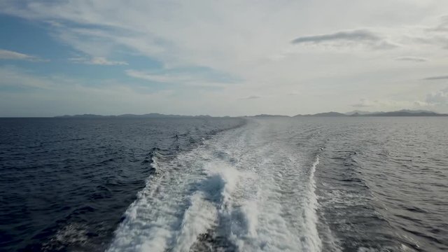 Ocean water jet stream from boat motor ferry Philippines