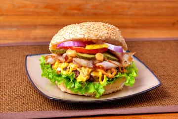 Beef burger on wooden background