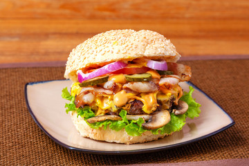 Beef burger on wooden background