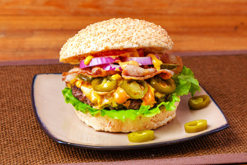 Beef burger on wooden background
