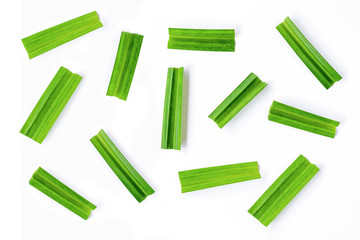 Slice of fresh green pandan leaves ( Pandanus amaryllifolius come ) isolated on white background. Top view. Flat lay.