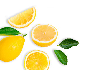 Fresh organic yellow lemon with sliced and  green leaves isolated on white background . Top view.