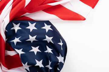 US American flag on white background. For USA Memorial day, Presidents day, Veterans day, Labor day, Independence or 4th of July celebration. Top view, copy space for text.