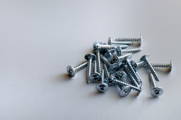 A group of roofing nails, isolated on white