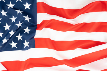 US American flag on white background. For USA Memorial day, Presidents day, Veterans day, Labor day, Independence or 4th of July celebration. Top view, copy space for text.