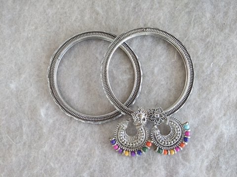 Silver Bangles And Earrings