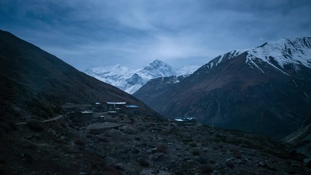Night Timelapse of Ledar Village with Views of Snowy Annapurna III and Gangapurna Mountains in Nepal