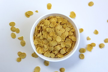 Dry corn flakes in a white plate