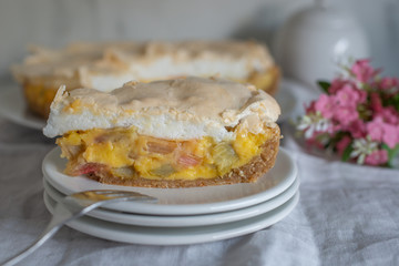 Home made rhubarb meringue cake on a plate