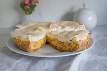 Home made rhubarb meringue cake on a plate