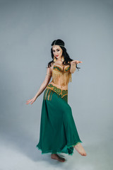 Dance of a sexy girl in an Indian costume