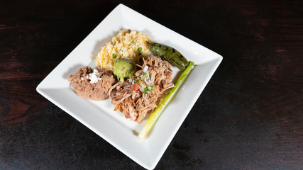 Carnitas with rice and beans