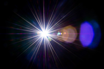 Lense flare sunlight ray. Sun shine flash effect or star spot glow light on black background. Gleams rounded and hexagonal shapes, rainbow halo.