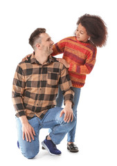 Happy man with little adopted girl on white background