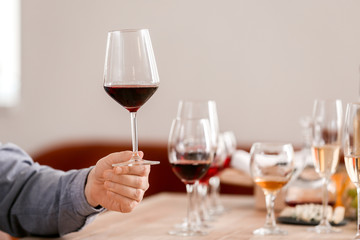 Man tasting wine at the restaurant