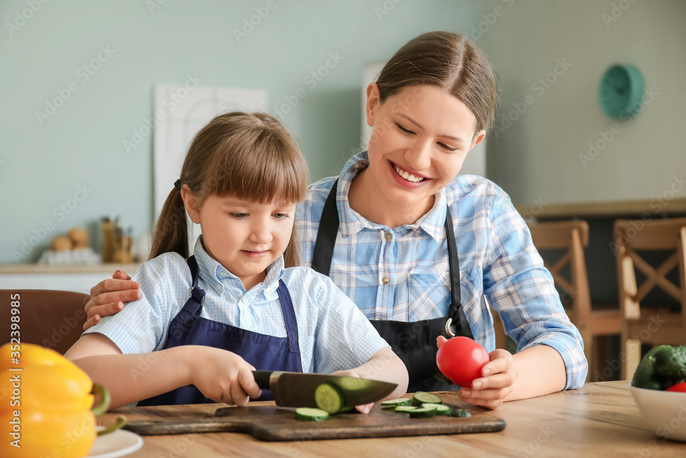 Sticker woman and her little daughter cooking in kitchen