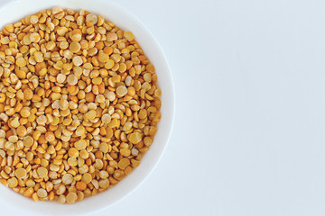 Yellow split peas used to make soup and pease pudding. isolated