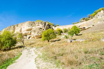 Obraz premium Panoramic view of mountains and valley covered with green forest. Beautiful mountain landscape.