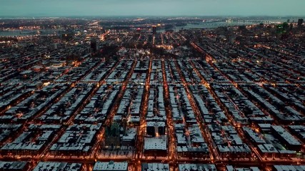 Beautiful aerial shot panning down on Montreal's downtown in Quebec winter - Powered by Adobe