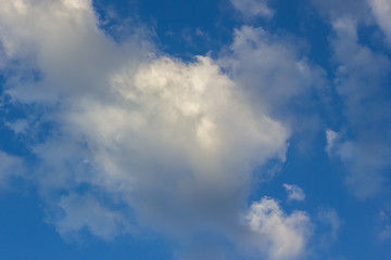 .Clouds in the firmament, evening sunset, clear Sunny day.