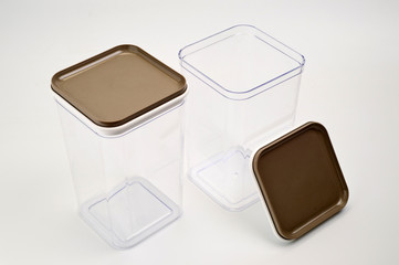 Transparent plastic containers for storing bulk products, cereals and pasta, photographed large on a white background.