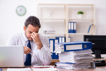 Two employees working in the office