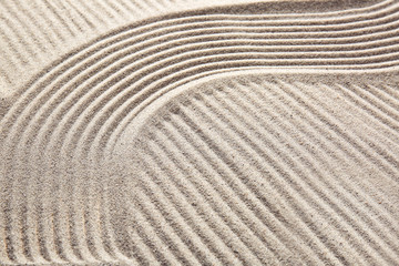 Texture of sand with lines. Zen concept