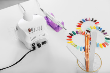 Workplace of professional manicure master in modern beauty salon