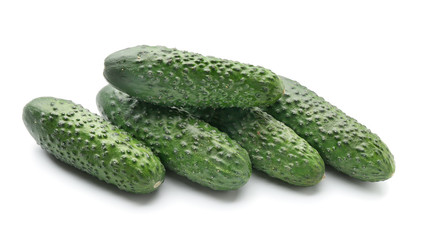 Fresh green cucumbers on white background
