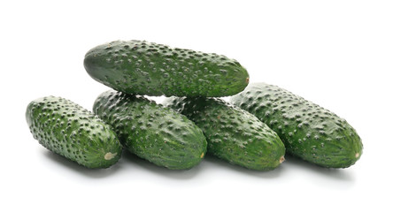 Fresh green cucumbers on white background