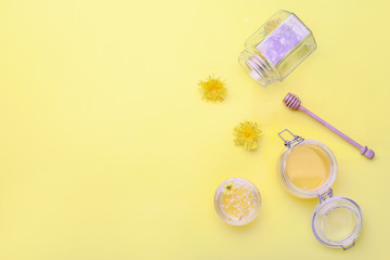 Composition with sweet dandelion honey on color background