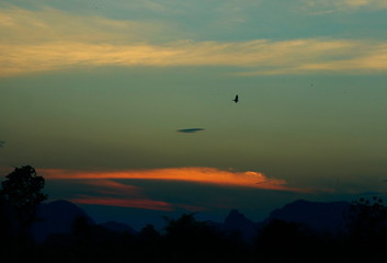 Evening sunset view with red light and mountain views
