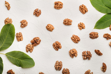Tasty walnuts on light background